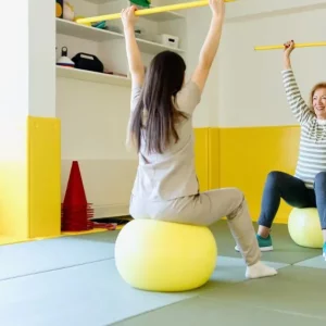 woman being shown coordination exercises for stroke patients after her stroke