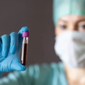 woman looking at blood type and deciding whether it increases stroke risk