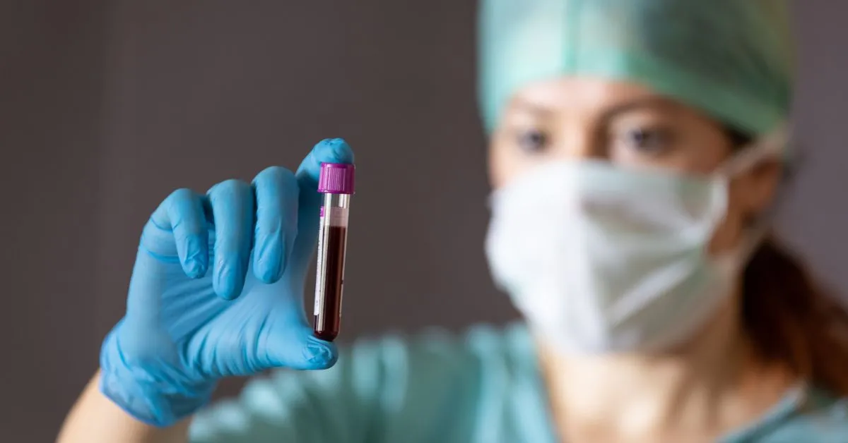 woman looking at blood type and deciding whether it increases stroke risk