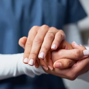 woman with tactile agnosia getting treatment from a therapist