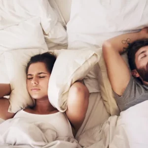 man with stroke and sleep apnea trying to not snore near his wife