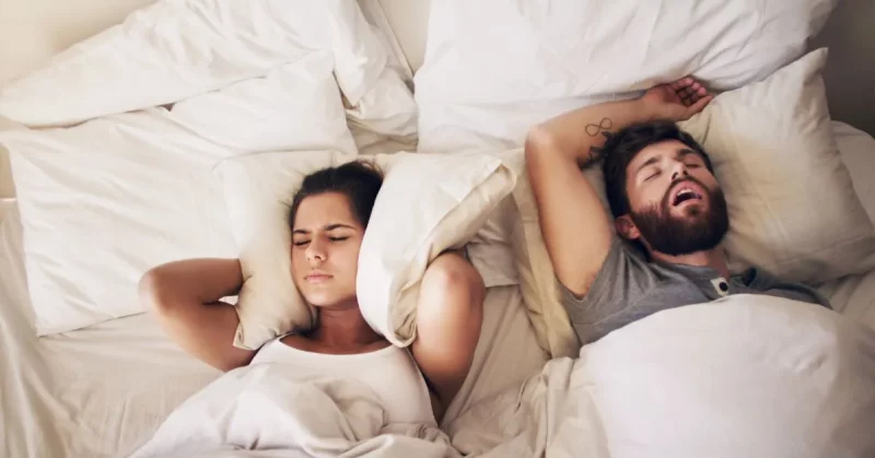 man with stroke and sleep apnea trying to not snore near his wife