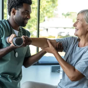 woman learning about the cross education effect in stroke rehab