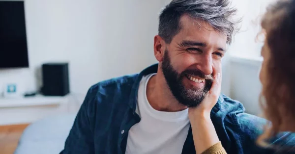 male brain injury survivor talking to his mom