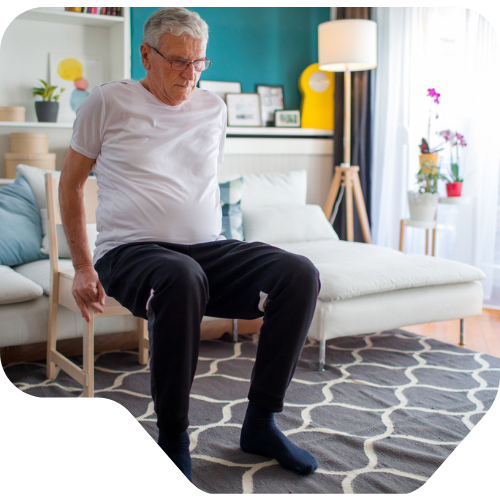 man exercising at his home with a virtual physical therapy program