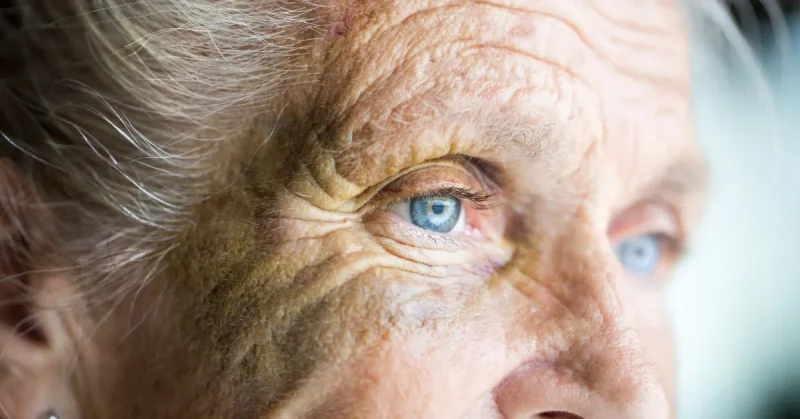 woman staring into the distance thinking about overcoming her fear of a second stroke