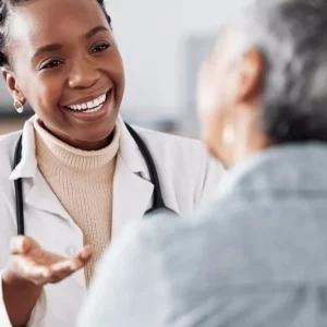 woman asking a question to her doctor after a stroke