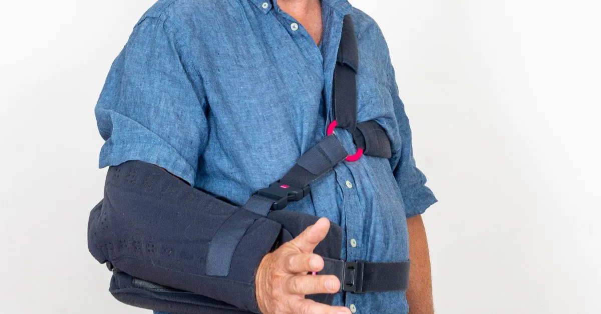 man using constraint induced movement therapy cimt